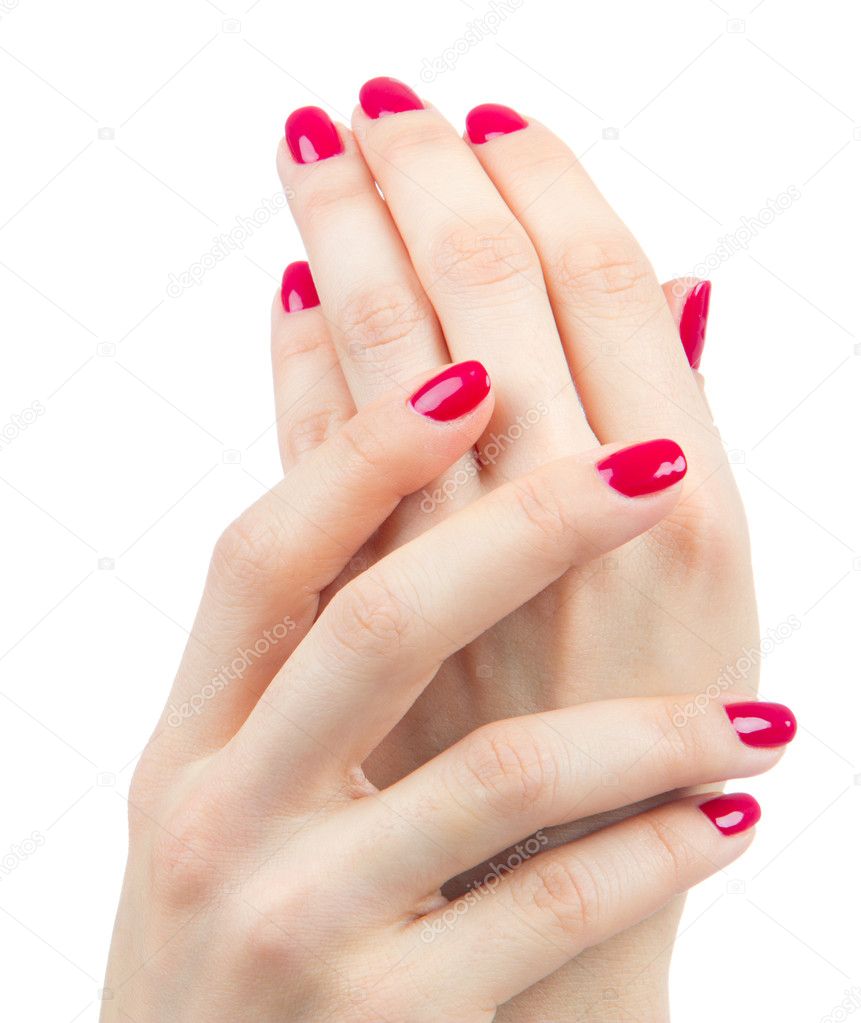 Beautiful Female Hands red manicure shellac near face