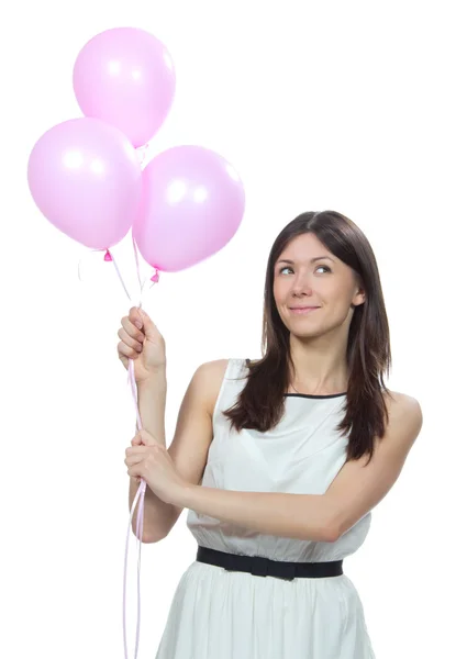 Junge glückliche Frau mit rosa Luftballons — Stockfoto