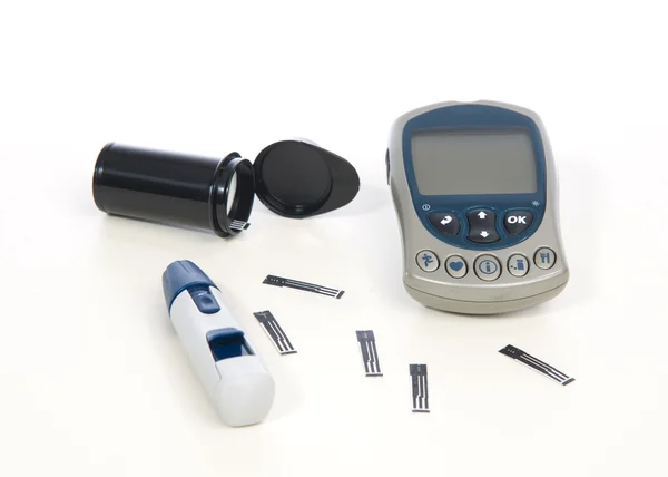 Diabetes composition glucometer measuring glucose level blood te — Stock Photo, Image