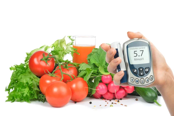 Diabetes-Konzept Glukometer und gesunde Ernährung lizenzfreie Stockbilder