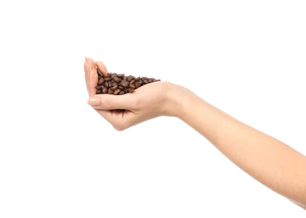 Mão segurando Grão de café torrado fresco — Fotografia de Stock