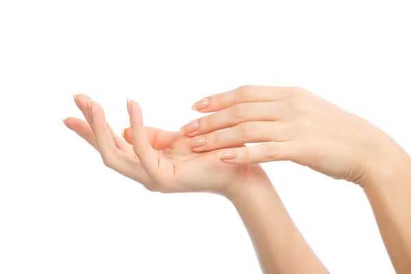 güzel kadının elleri ile Fransız manikür çivi