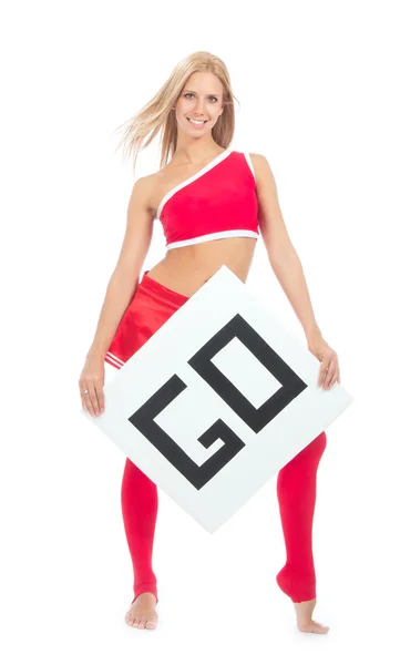 Cheerleader woman pointing her finger at a board — Stock Photo, Image