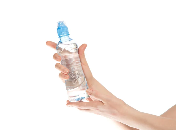 Drinking water bottle in woman hands — Stock Photo, Image