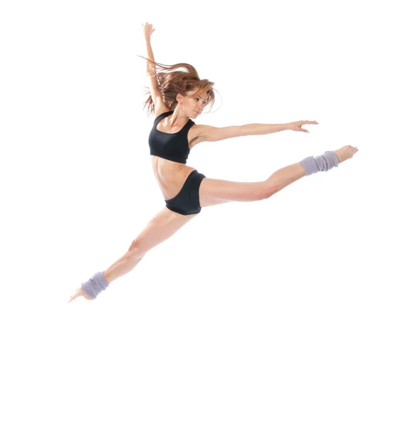 Modern slim stylish teenage girl jumping dancing — Stock Photo, Image