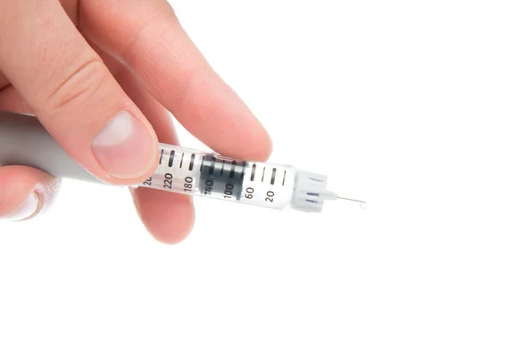 Doctor with medical syringe with insulin in hand — Stock Photo, Image