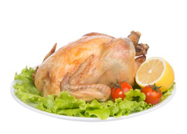 süslenmiş bir tabakta Şükran kavrulmuş tavuk