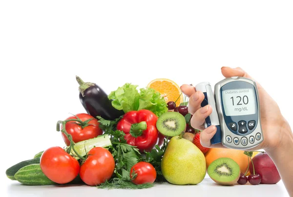 Diabetes konceptet glukos mätaren frukter och grönsaker — Stockfoto