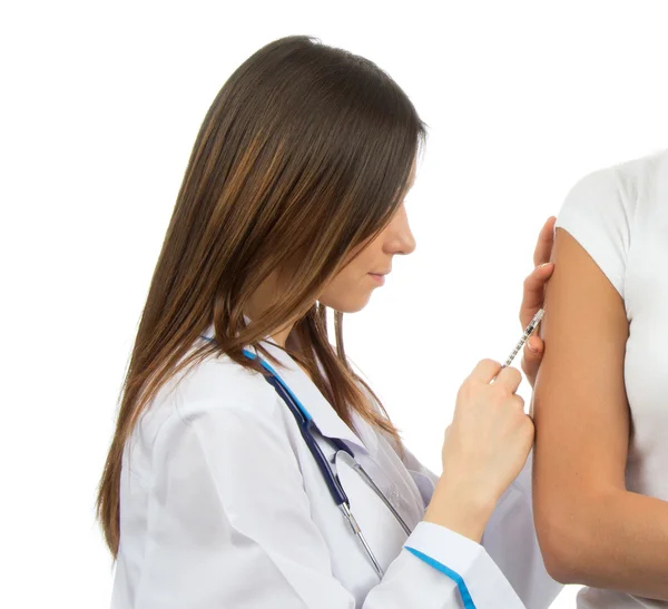 Making insulin or flu vaccination shot by syringe — Stock Photo, Image