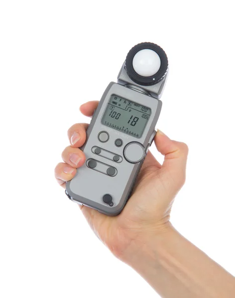 Lichte flash meter in hand geïsoleerd — Stockfoto