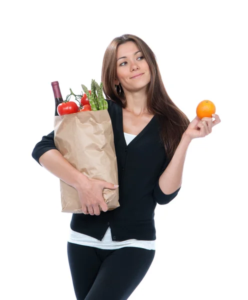Young woman holding shopping bag with groceries vegetables — Stock Photo, Image
