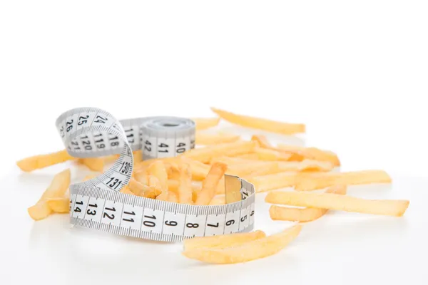 French fries chips meal with tape measure — Stock Photo, Image