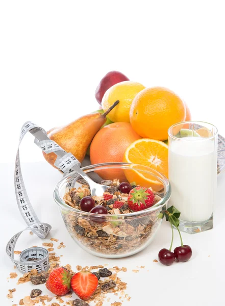 Muesli granen kom en lepel met tape maatregel centimetr rozijnen — Stockfoto