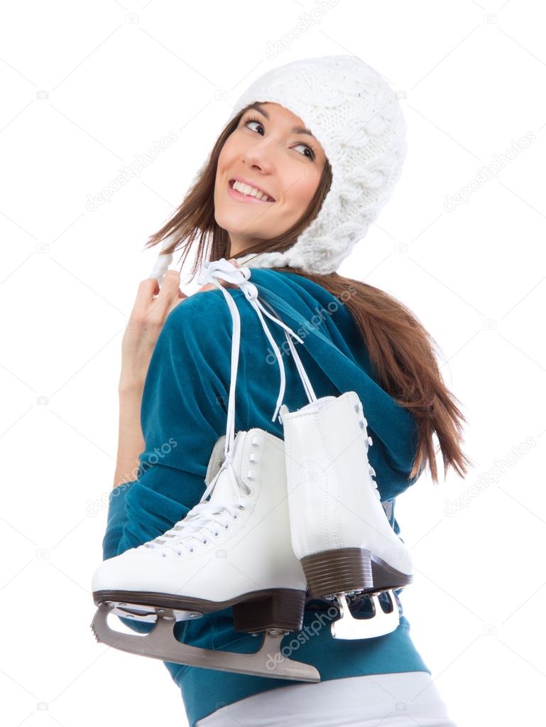 Young woman with ice skates for winter ice skating sport