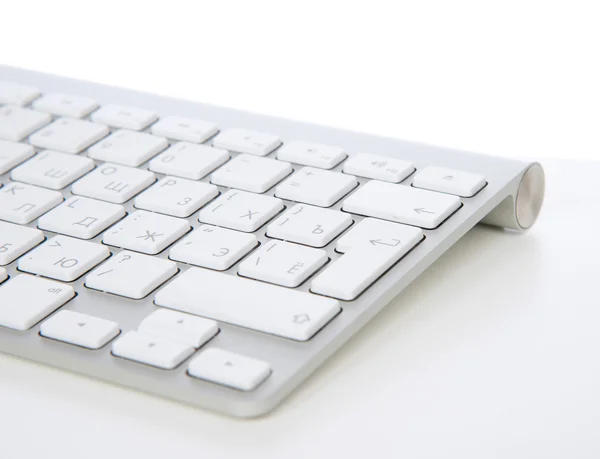 Imagen de cerca del teclado remoto inalámbrico de la oficina del ordenador —  Fotos de Stock