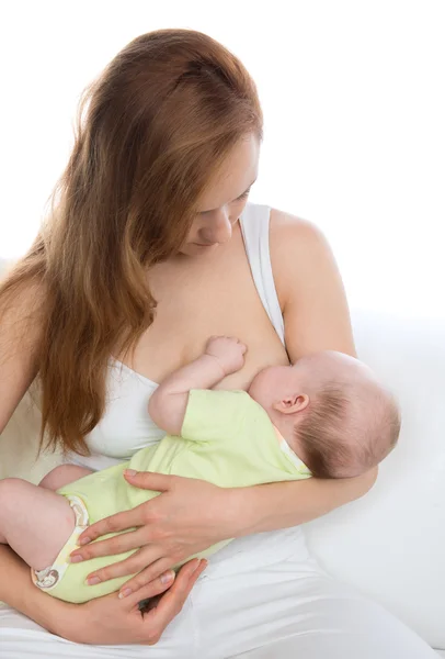 Young mother woman breastfeeding her child baby infant girl Stock Photo