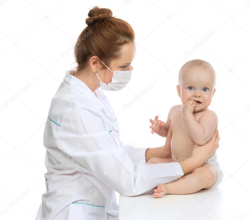 Pediatrician doctor holding in his arms child baby girl
