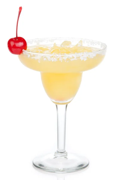 Yellow margarita cocktail with red cherry in chilled salt rimmed — Stock Photo, Image