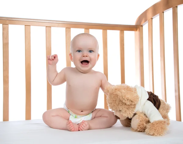 Infant child baby girl toddler shouting in diaper with teddy bea — Stock Photo, Image