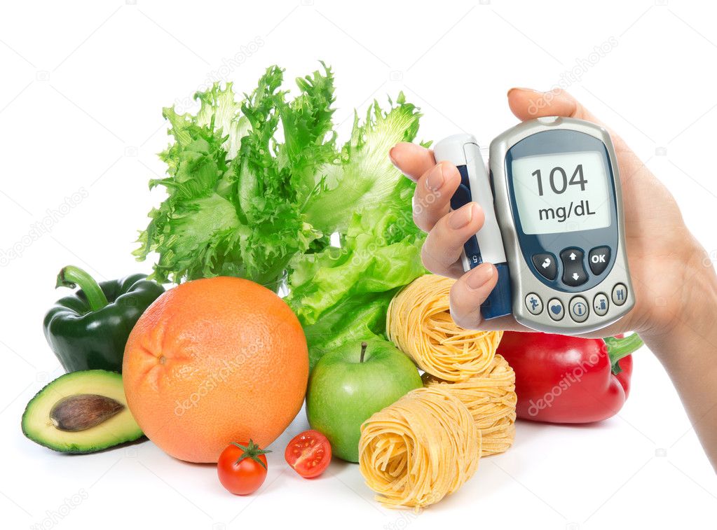 glucose level blood test meter in hand and healthy organic food 