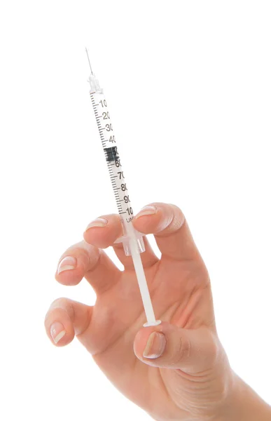 Arzthand mit medizinischer Insulinspritze zur Injektion bereit — Stockfoto