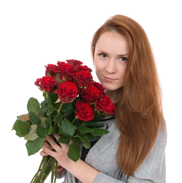 Young happy woman with bouquet of red roses flowers — Stock Photo, Image