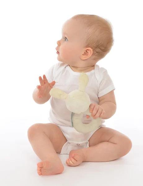 Infant child baby toddler sitting smiling with soft bunny toy — Stock Photo, Image