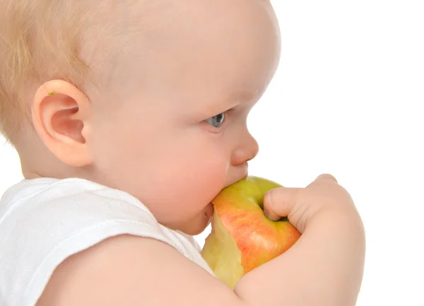 Infant child baby girl eating apple closeup — Stock Photo, Image