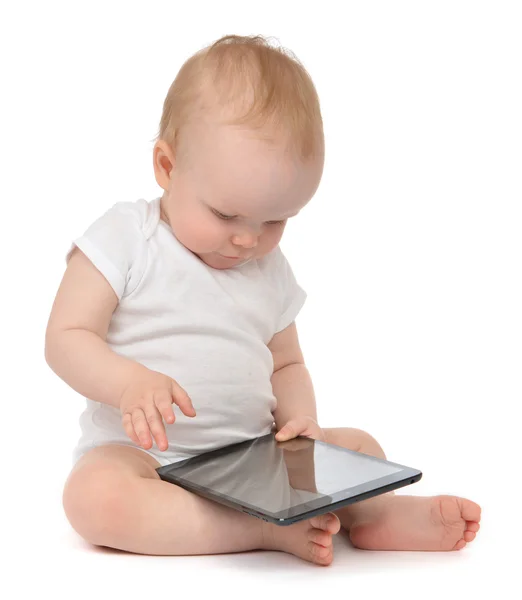 Infant child baby toddler sitting and typing digital tablet mobi — Stock Photo, Image