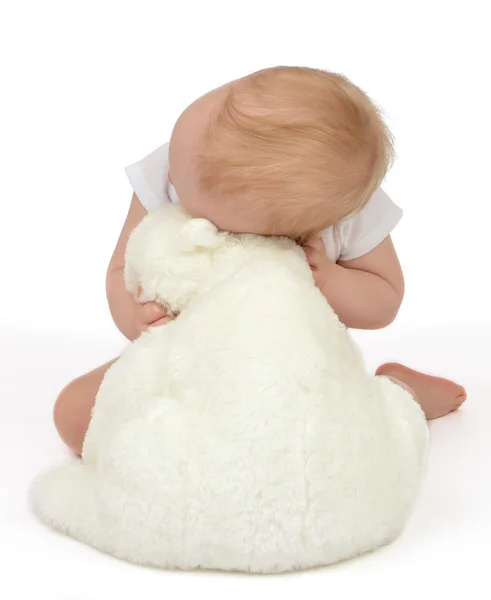 Infant child baby girl hugging soft teddy bear sleeping — Stock Photo, Image