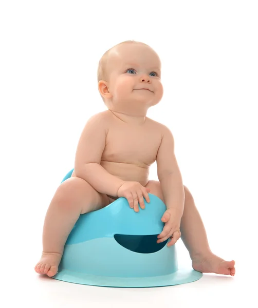 Infant child baby boy toddler sitting on toilet stool pot — Stock Photo, Image