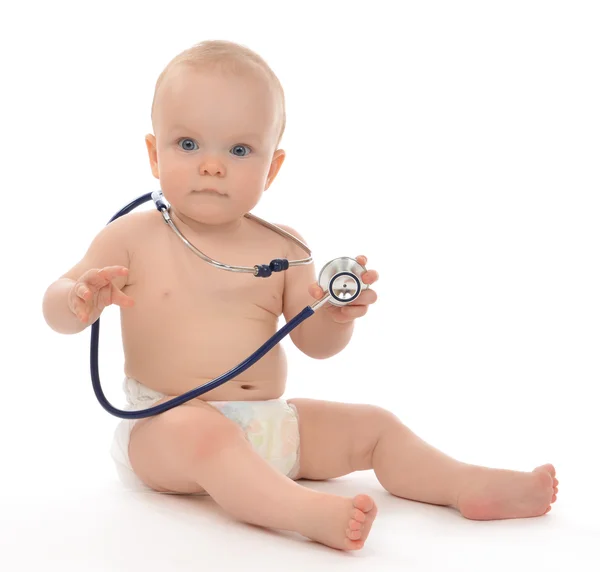 Infant child baby toddler sitting with medical stethoscope Royalty Free Stock Photos
