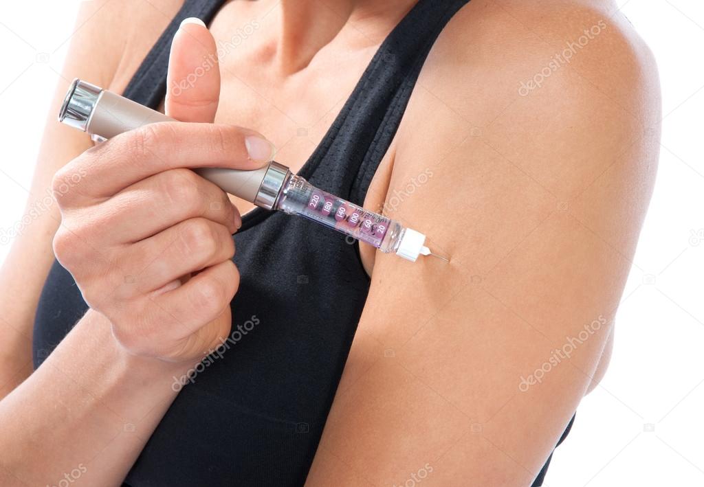 Diabetes dependent woman making insulin flu shot 