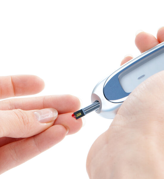 Diabetic patient measuring glucose level blood test