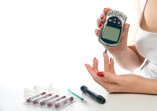 Diabetes patient measuring glucose level blood test — Stock Photo, Image