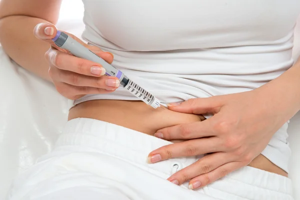 Diabetes patient insulin shot by syringe with dose of lantus — Stock Photo, Image