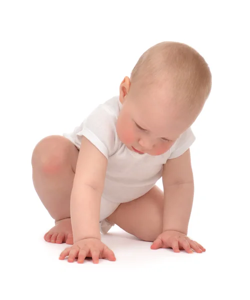 New born infant child baby toddler sitting and touching floor wi — Stock Photo, Image