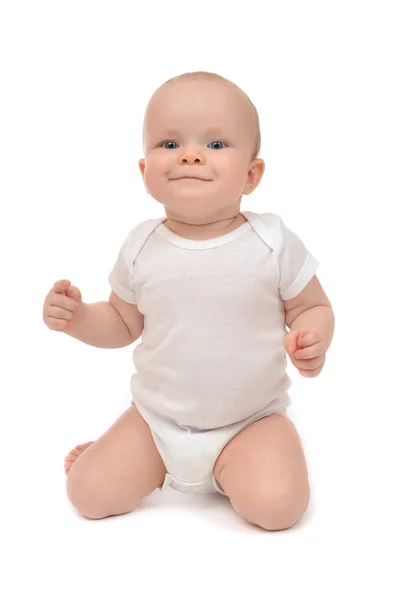 Bebé bebé niño sentado en sus rodillas y feliz sonrisa —  Fotos de Stock