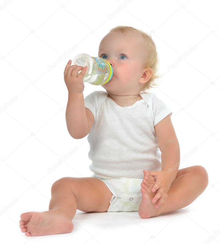 Infant child baby toddler sitting and drinking water 