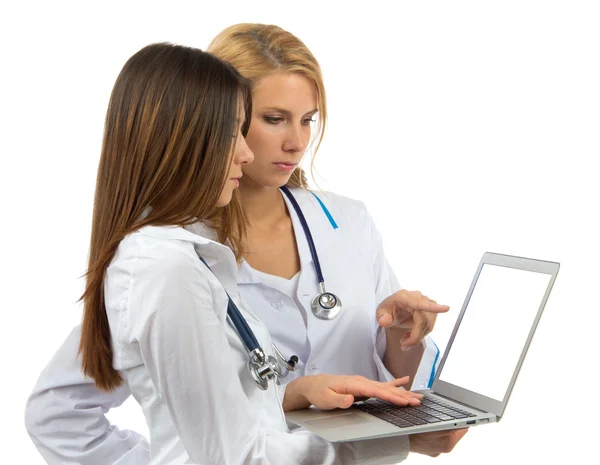 Nurse research laptop computer woman pointing at the monitor dis — Stock Photo, Image