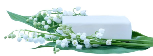 White soap with lily of the valley isolated on white background — Stock Photo, Image