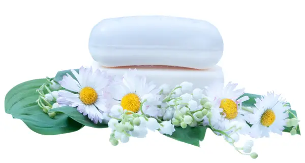 Trozos de jabón con flores aisladas sobre fondo blanco —  Fotos de Stock