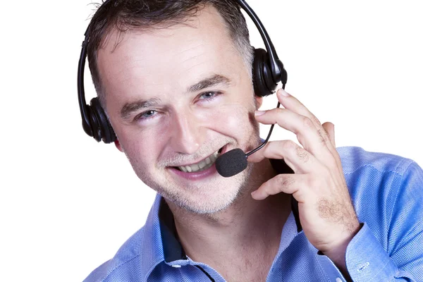 Empresario con camisa azul, auricular con llamada telefónica . —  Fotos de Stock