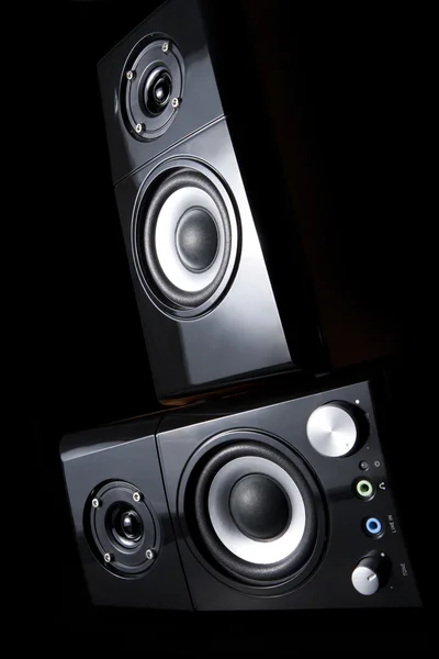 A few speakers on a black background. — Stock Photo, Image