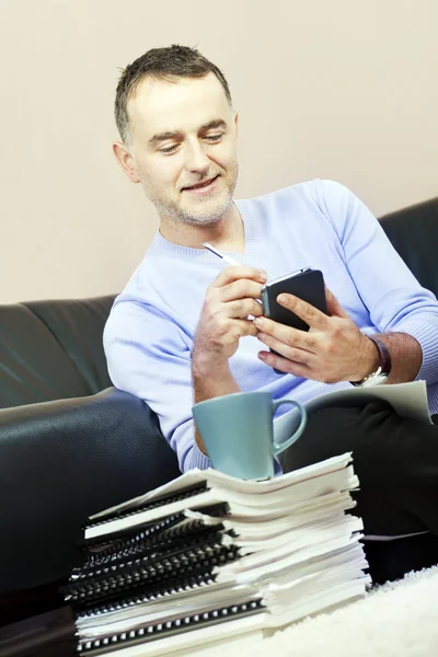 Successful man working at home. — Stock Photo, Image