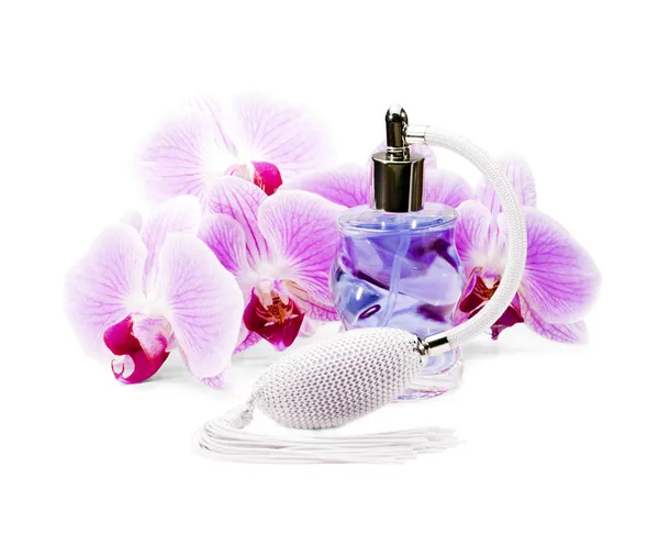 Dla kobiet perfumy i orchidea kwiat. — Zdjęcie stockowe