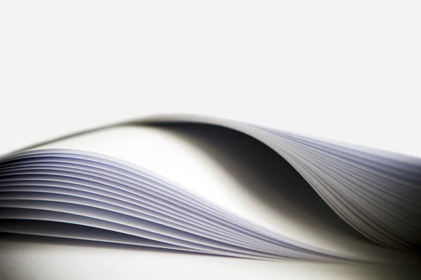 Arched book pages viewed up close. — Stock Photo, Image