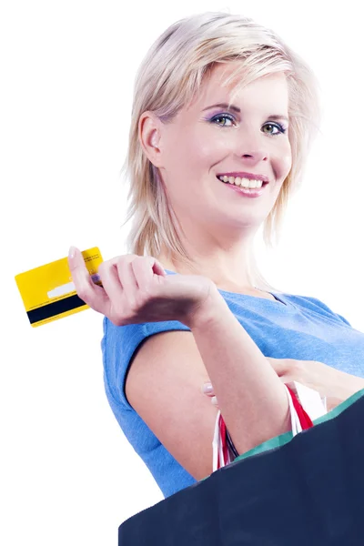 Credit cards and shopping bags holding the hand of a woman. — Stock Photo, Image