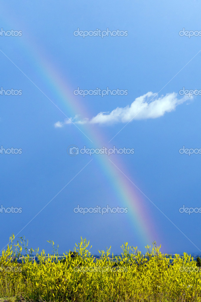 the blue sky, rainbow and clouds.