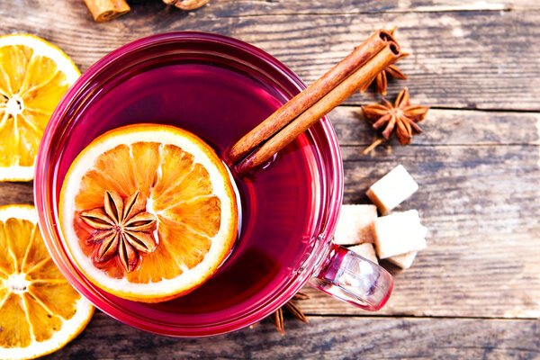 Delicious cup of tea on a rustic wooden table.